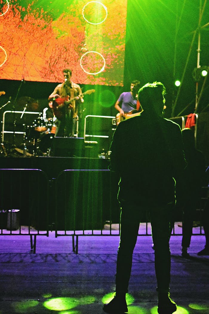 Exciting live concert with musicians performing on stage in Iași, Romania.